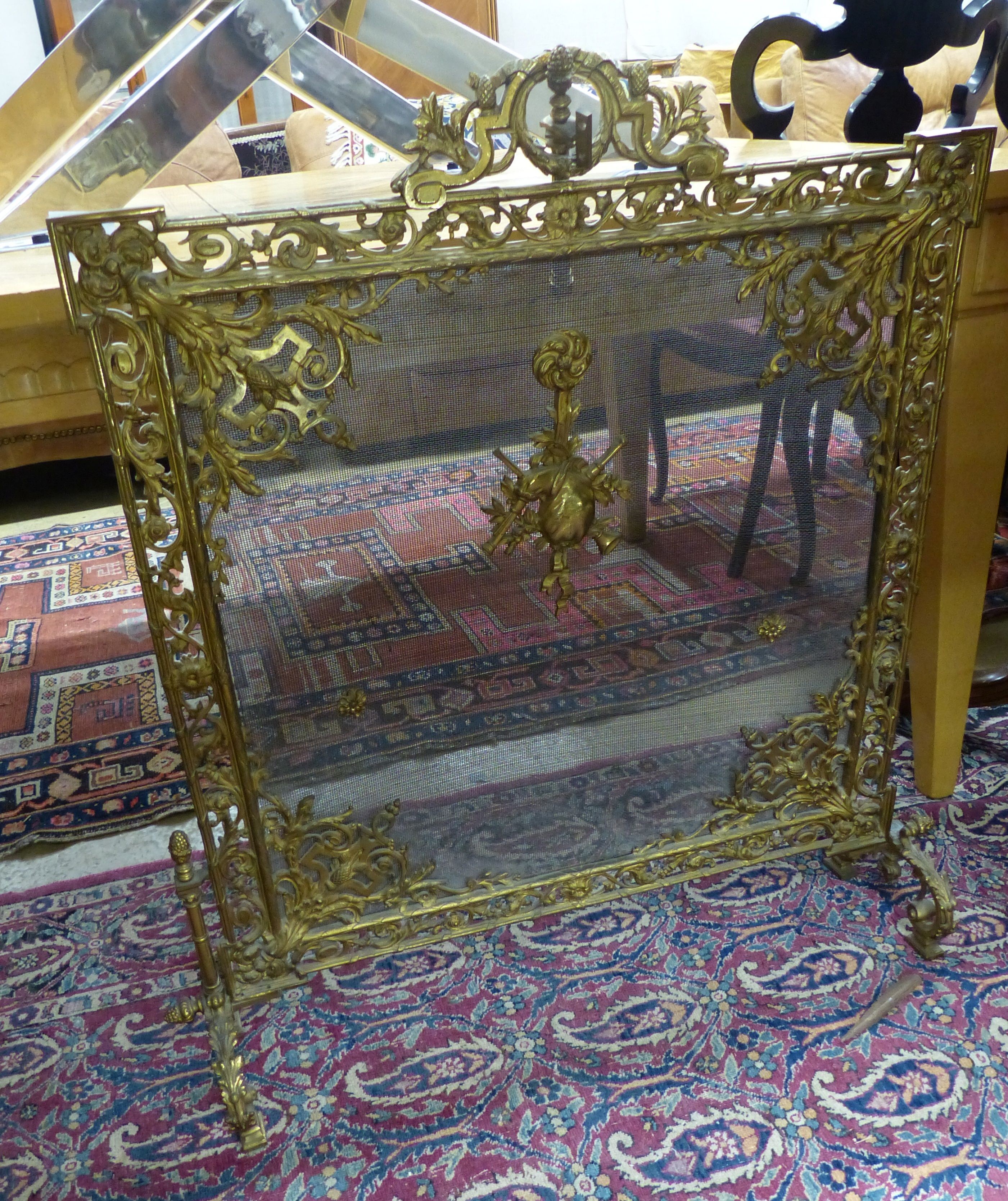 A Louis XV style bronze cheval firescreen, W.70cm H.88cm